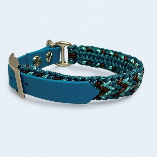small dog collar made from teal and brown paracord on a light background.